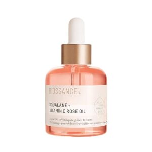 Caudalie Vinoperfect Brightening Dark Spot Serum bottle with a dropper, showing "Olive Squalane Hydrates & soothes" and "Viniferine Visibly brightens all types of dark spots".